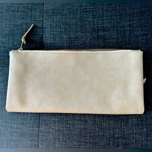 Purse that folds in half. 3 pockets. Strapless. Clutch purse.